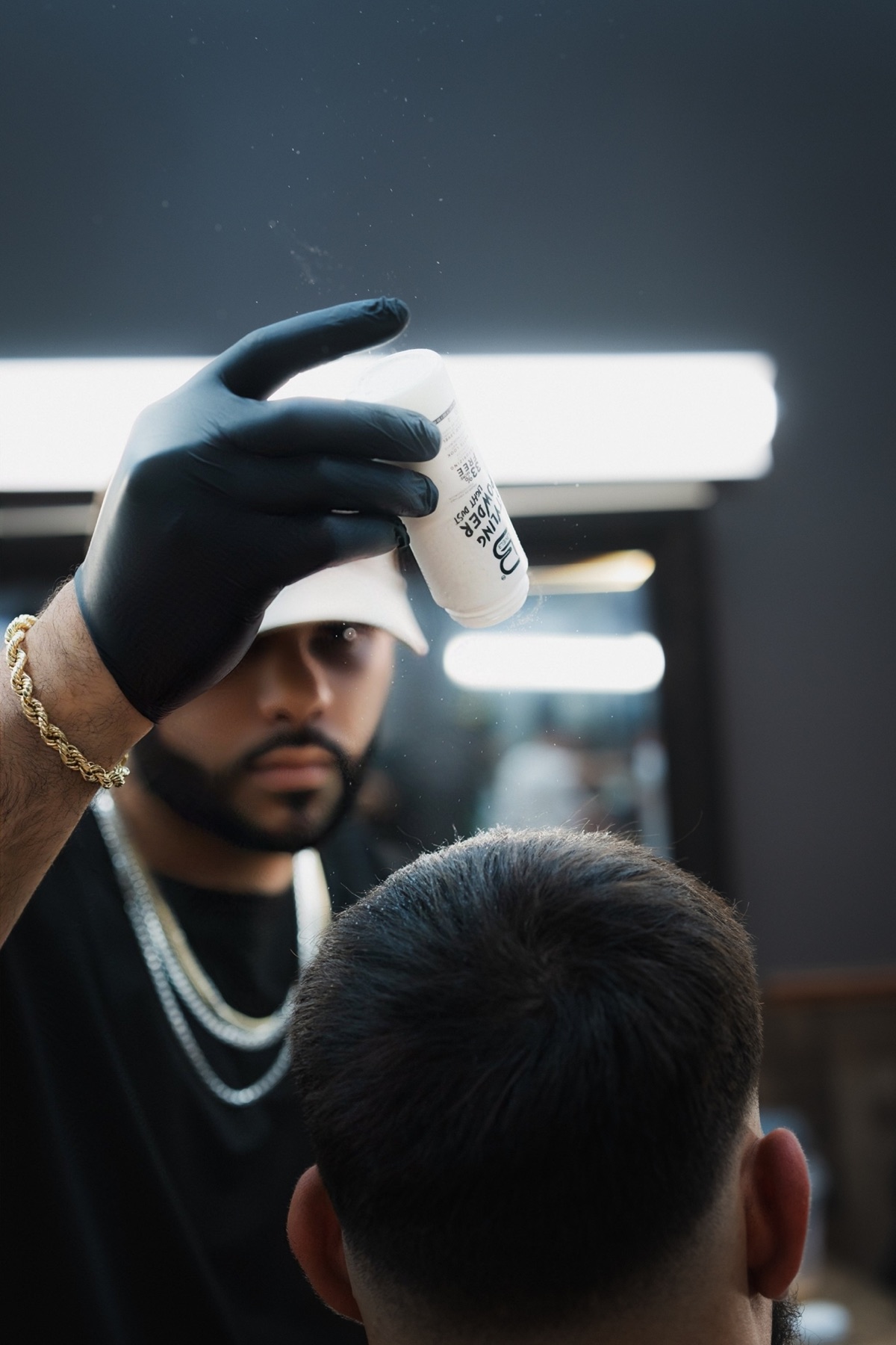 Tulpi The Barber performing a precision barber service in Greenville, South Carolina